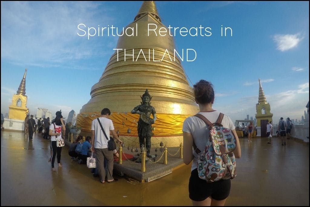 Spiritual Places in Asia Visitors surround a golden Buddhist stupa under a clear sky in Thailand, with 'Spiritual Retreats in THAILAND' text above. A woman with a patterned backpack stands in the foreground, looking towards the stupa, where people engage in prayer and reflection.