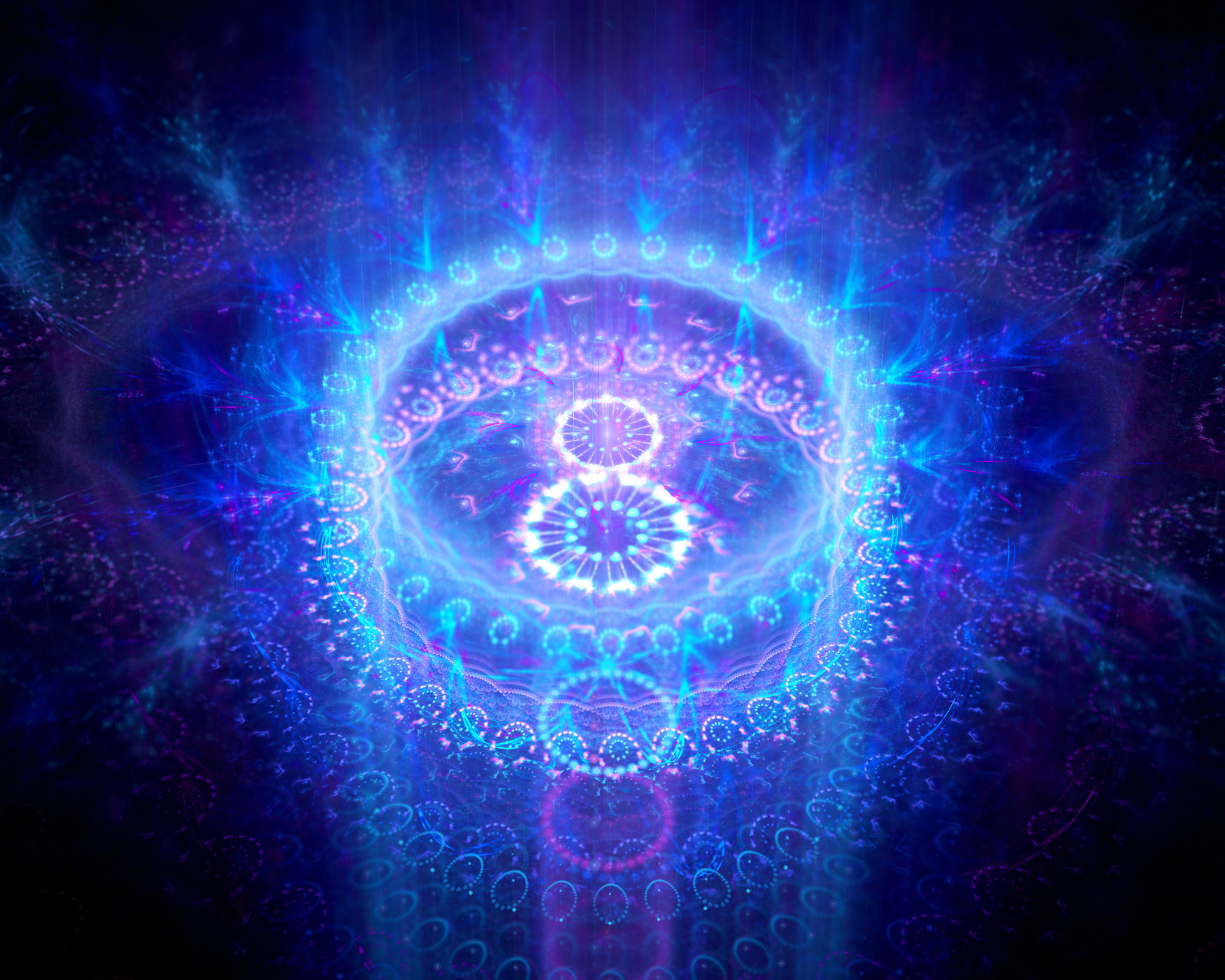 A vibrant, glowing blue and violet fractal mandala representing the Crown Chakra’s spiritual energy and higher-consciousness activation.