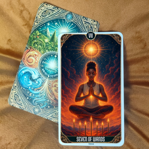 Seven of Wands tarot card meaning illustrated by an upright card placed on a tarot deck, symbolizing inner strength, boundaries, and defending your truth.