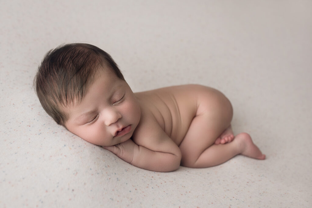 newborn baby boy bum up