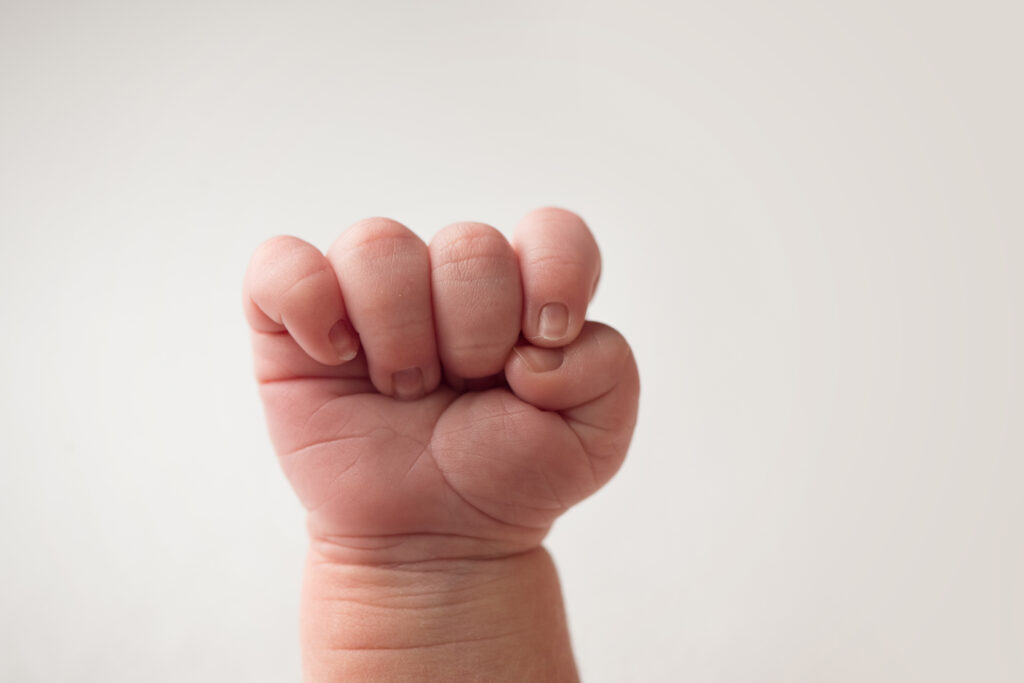 close up of newborn baby toes