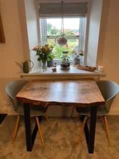 A solid live edge small table - sent by a customer