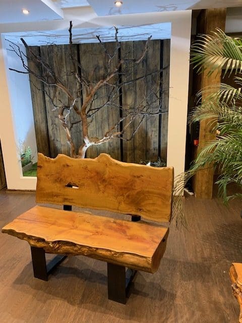 Bench made with half a log and a live edge rest - sent by a customer