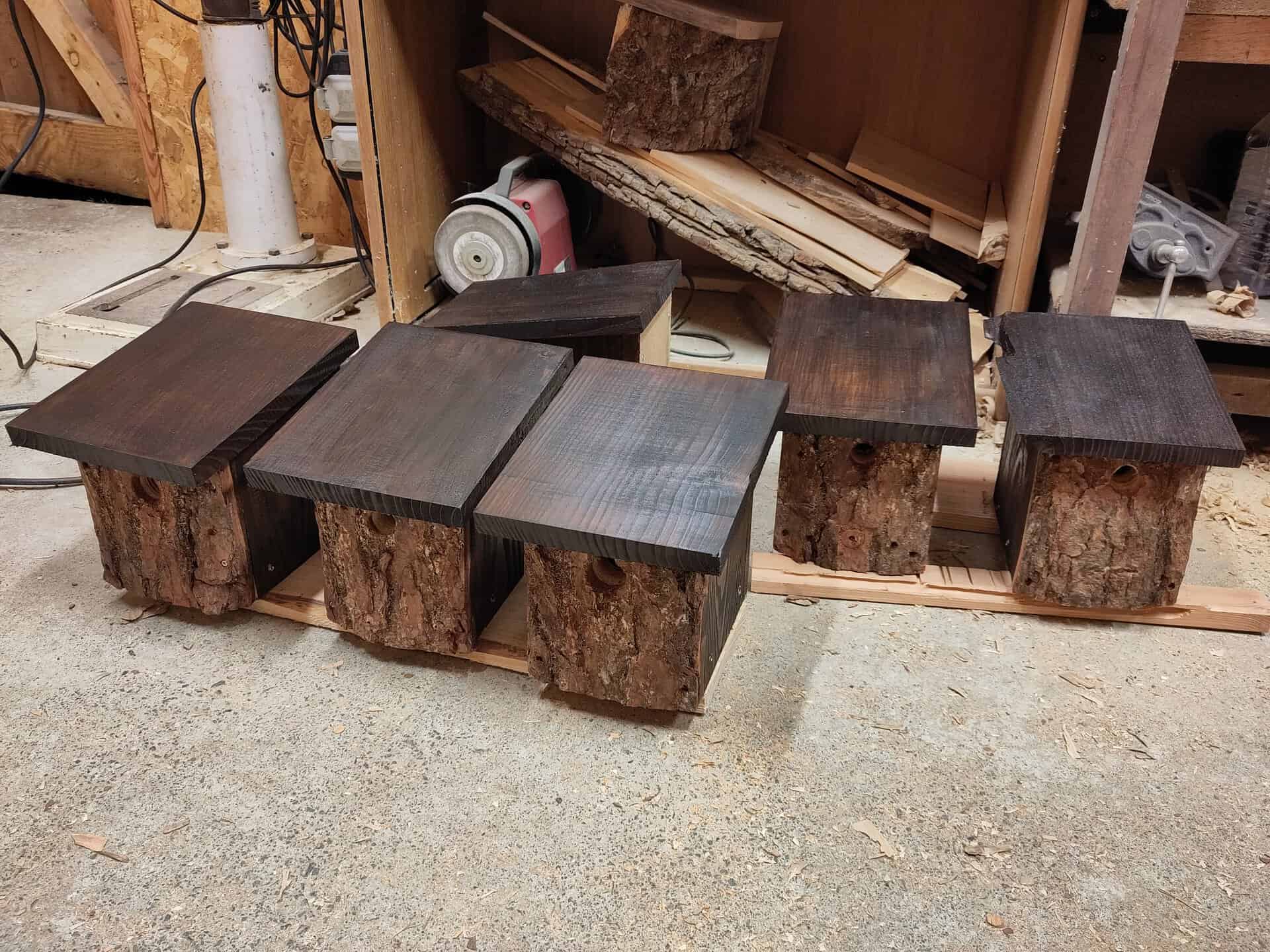 Natural look bird nest boxes, made using Scottish Larch with the bark left on