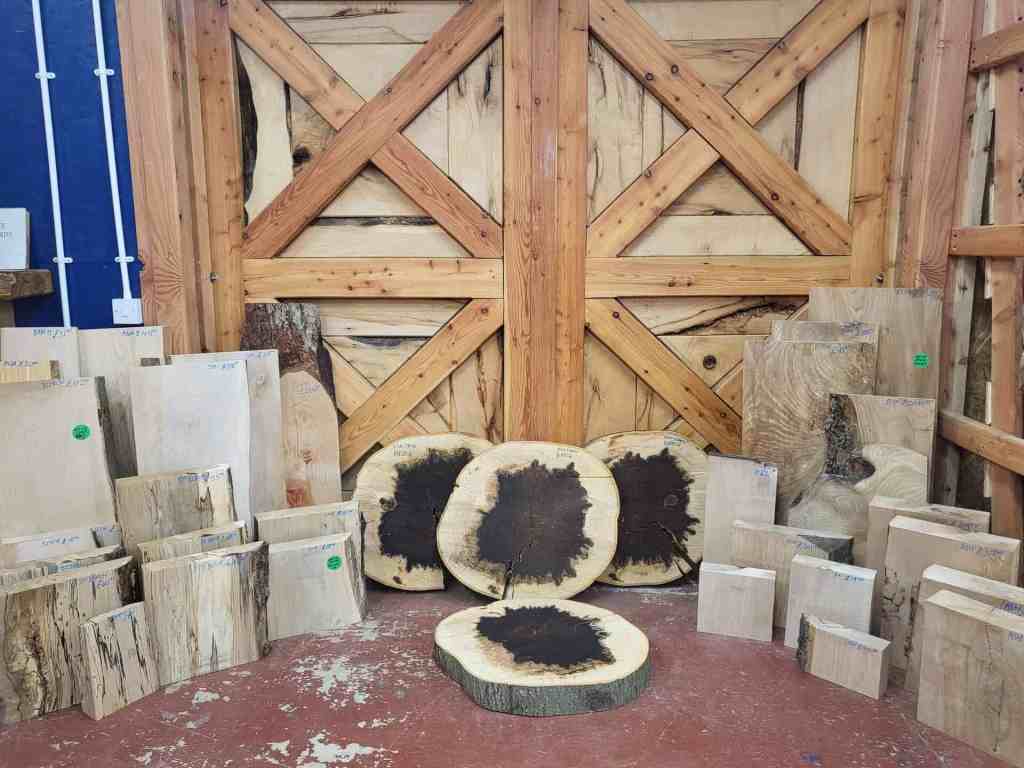 A selection of interesting and naturally shaped hardwoods in the Scottish Wood shop - burrs, blanks, offcuts - ideal for using in craft projects and woodworking