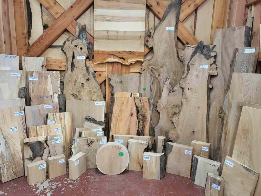 A selection of differently shaped hardwoods in the Scottish Wood shop - burrs, blanks, offcuts - ideal for using in craft projects and woodworking