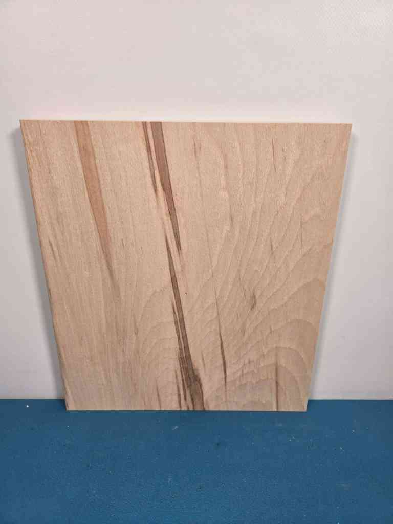 Colour streaked beech offcut showing natural wood grain and colour variations.