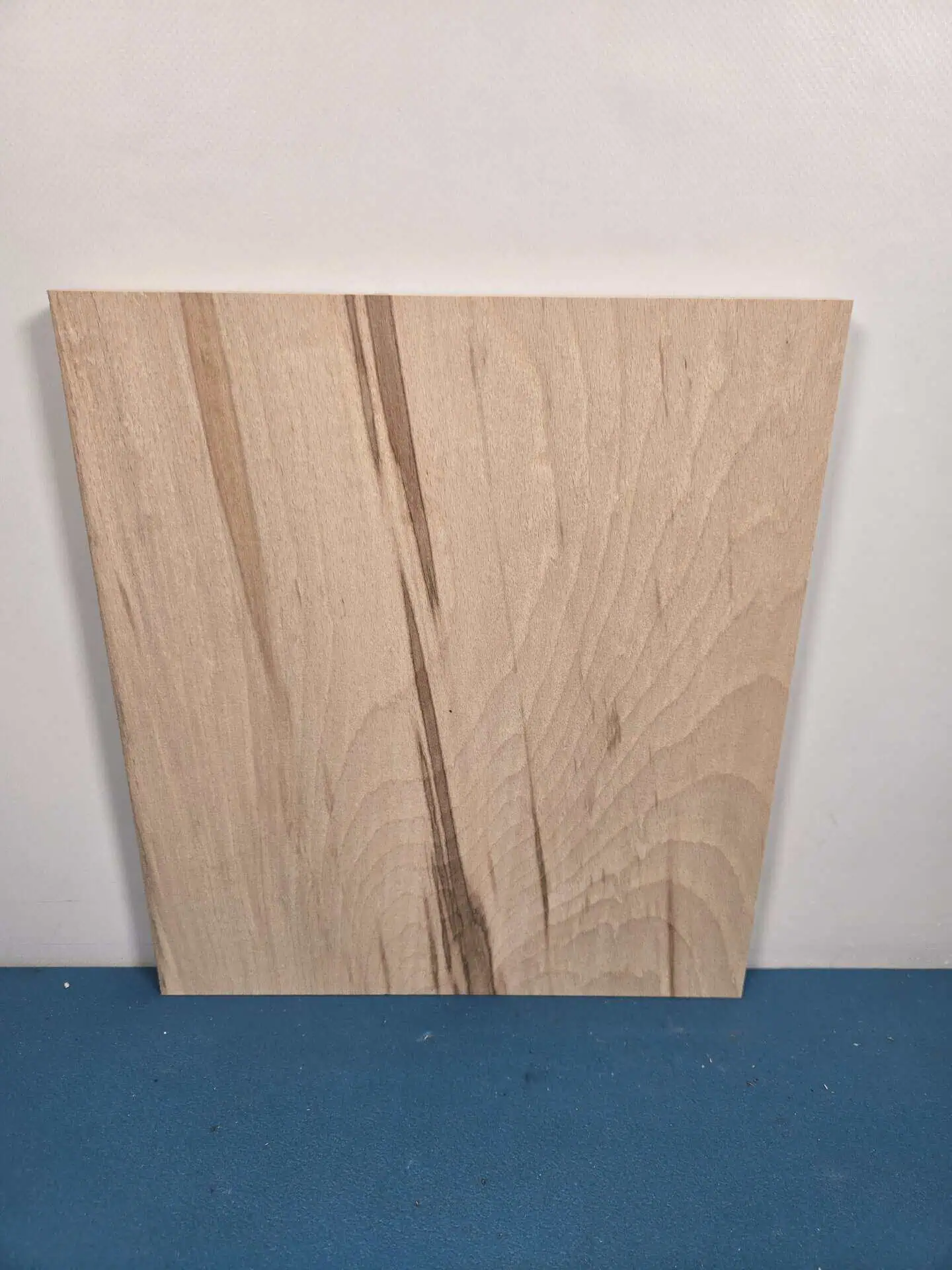 Colour streaked beech offcut showing natural wood grain and colour variations.
