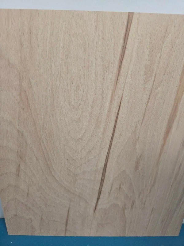 Colour streaked beech offcut showing natural wood grain and colour variations.
