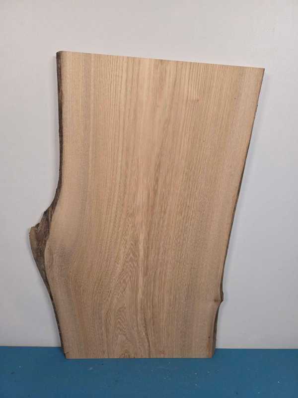 Elm natural edge offcut timber board with smooth surface and irregular edge.