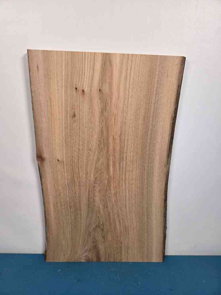 Clean Elm offcut showing natural wood grain and smooth surface.