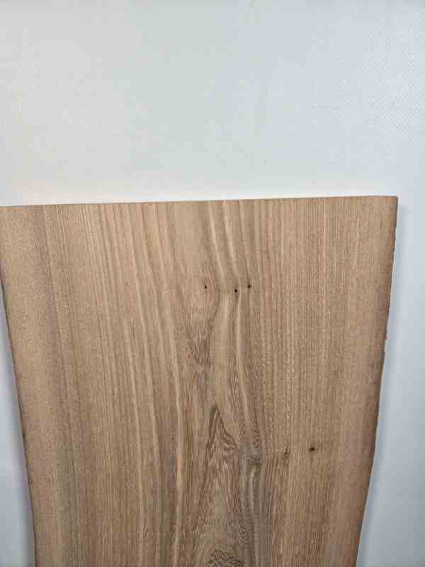 Clean Elm offcut showing natural wood grain and smooth surface.