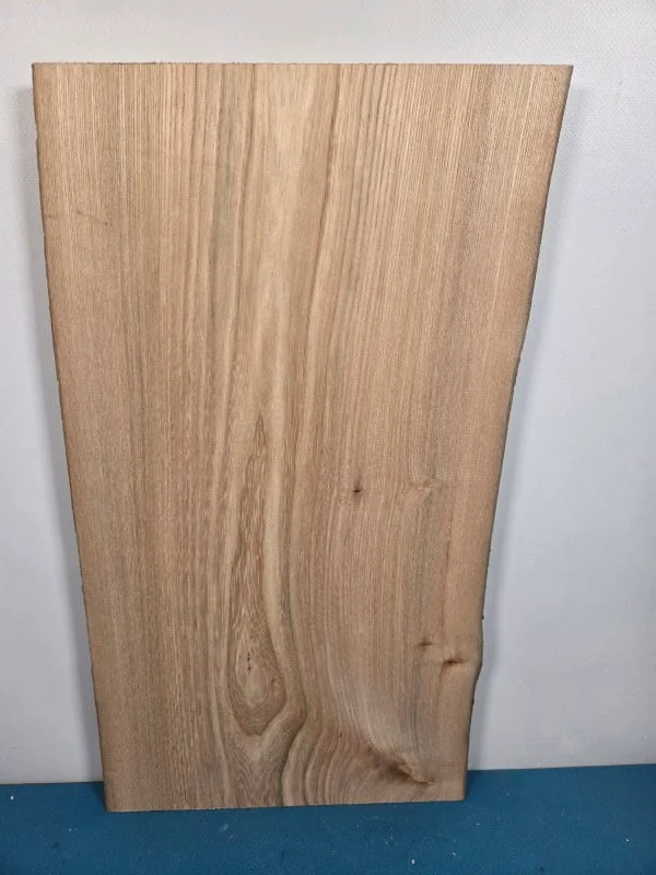 Straight grain Elm offcut showing natural wood texture and light colour.