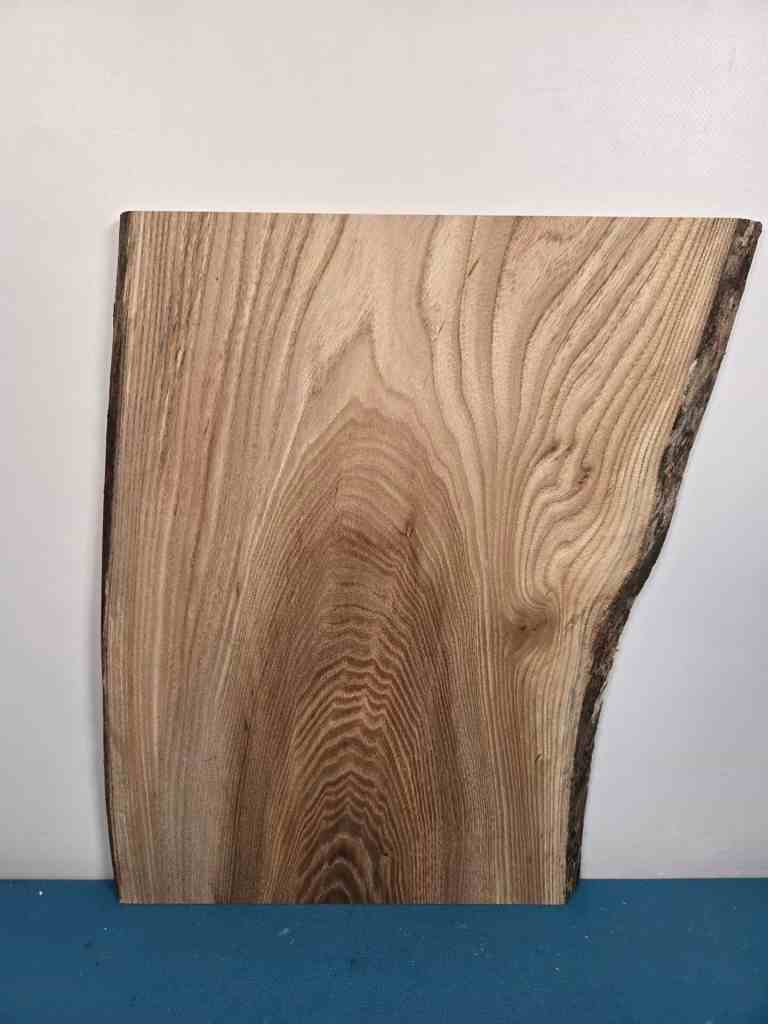 Beautiful Elm offcut showing natural grain and edge detail for woodworking.