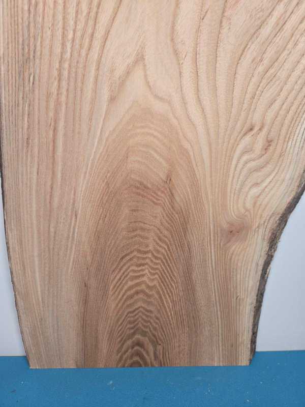 Beautiful Elm offcut showing natural grain and smooth surface for woodworking.