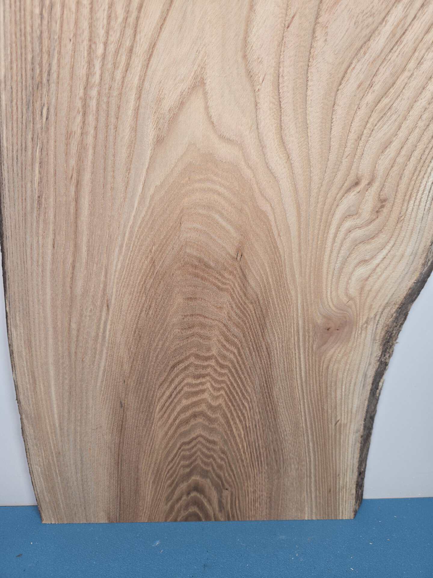 Beautiful Elm offcut showing natural grain and smooth surface for woodworking.