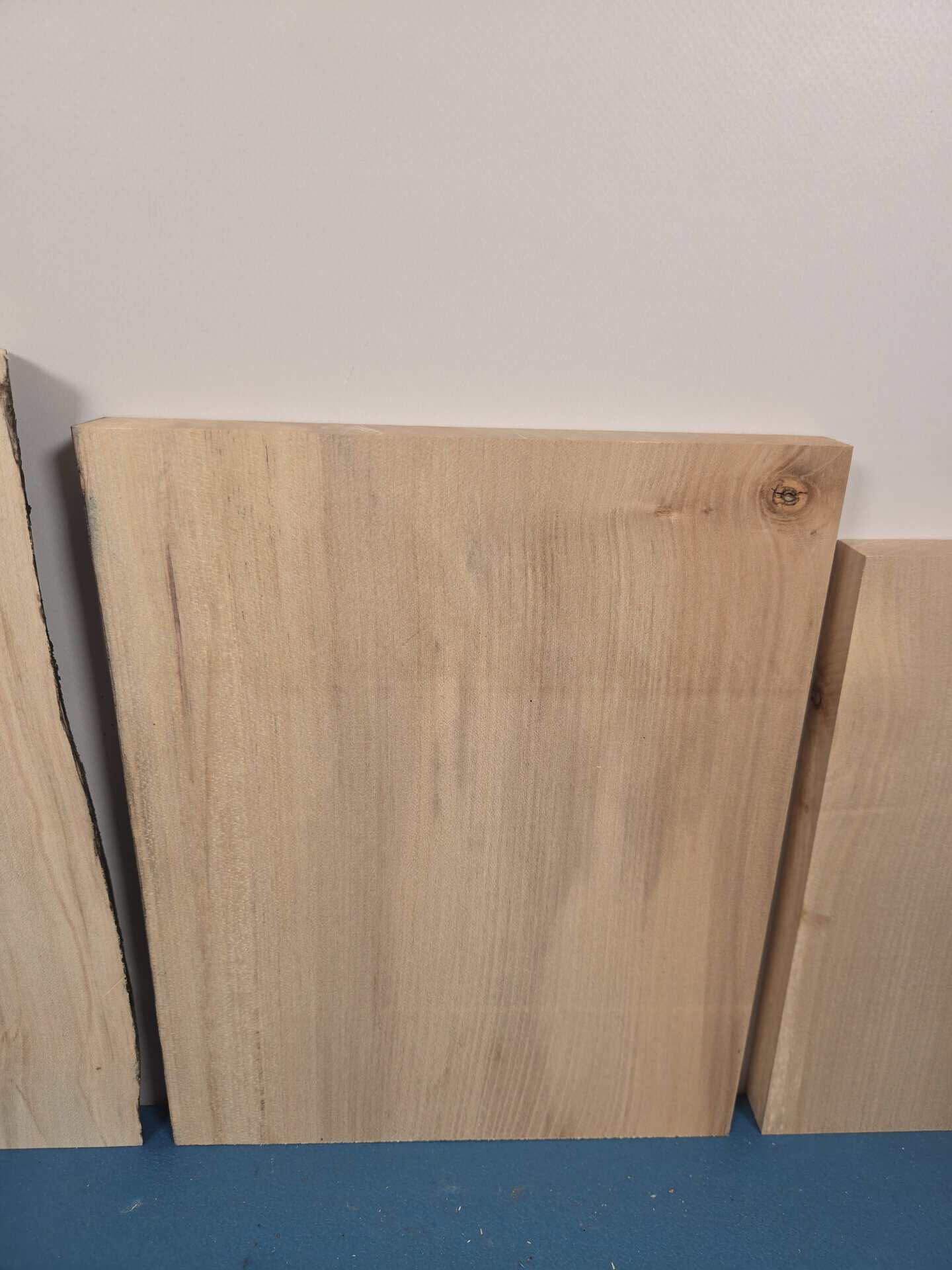 Sycamore offcut timber board with smooth surface and natural wood grain.