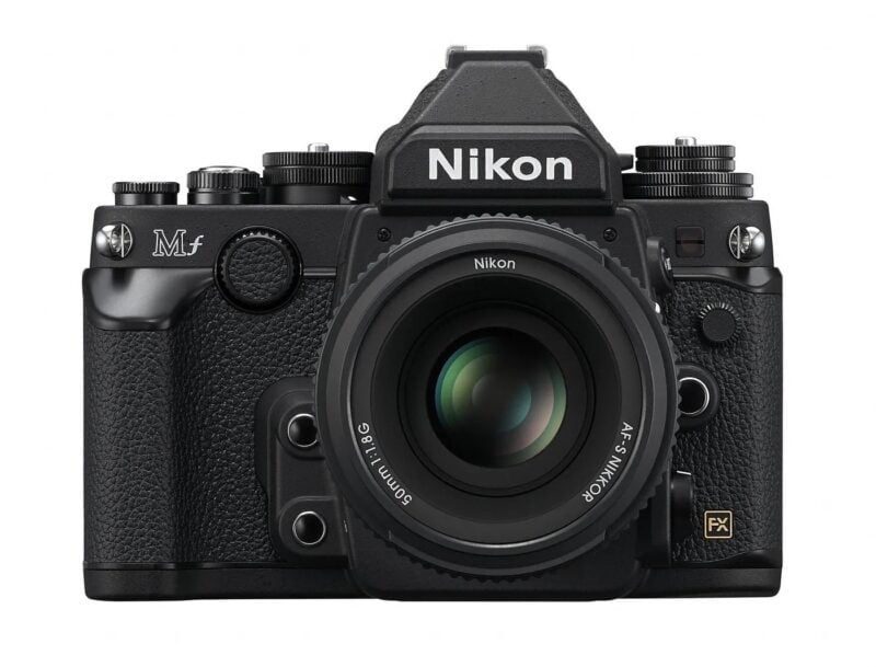The Perfect EDC Camera - Nikon Zf Nikon camera front view with lens and controls.