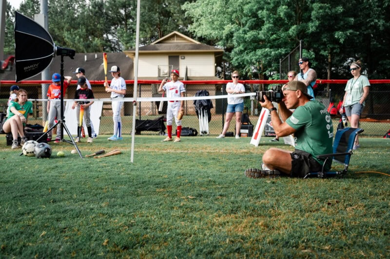 The Perfect EDC Camera - Nikon Zf Photographer capturing youth baseball team portrait on the field.