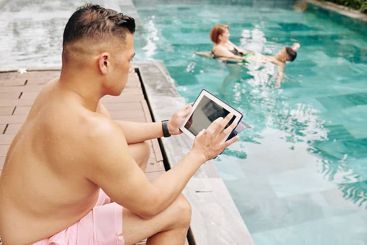 man seeing pool automated control system device
