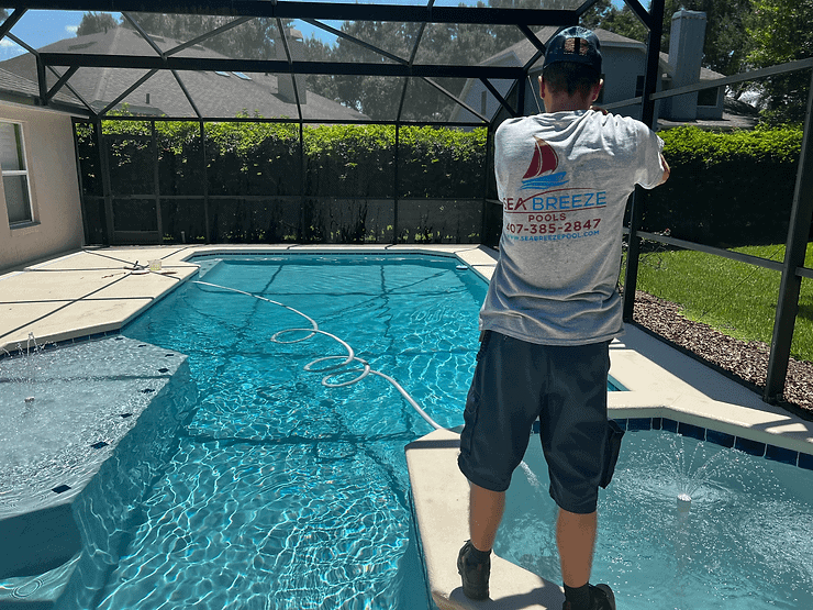 man doing work to make the pool cool