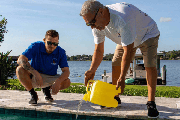 Pool Surface Stains being treated with chemicals