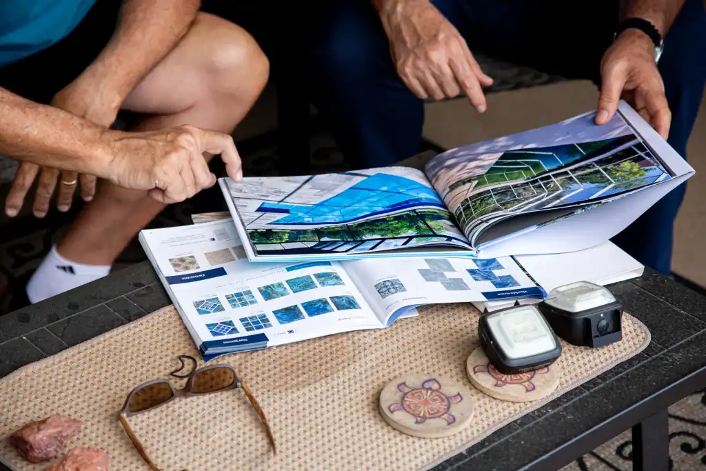 Booklet of tiles and resurfacing options from Sea Breeze Pools.