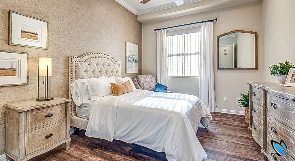A clean, modern private bedroom in an assisted living small care home