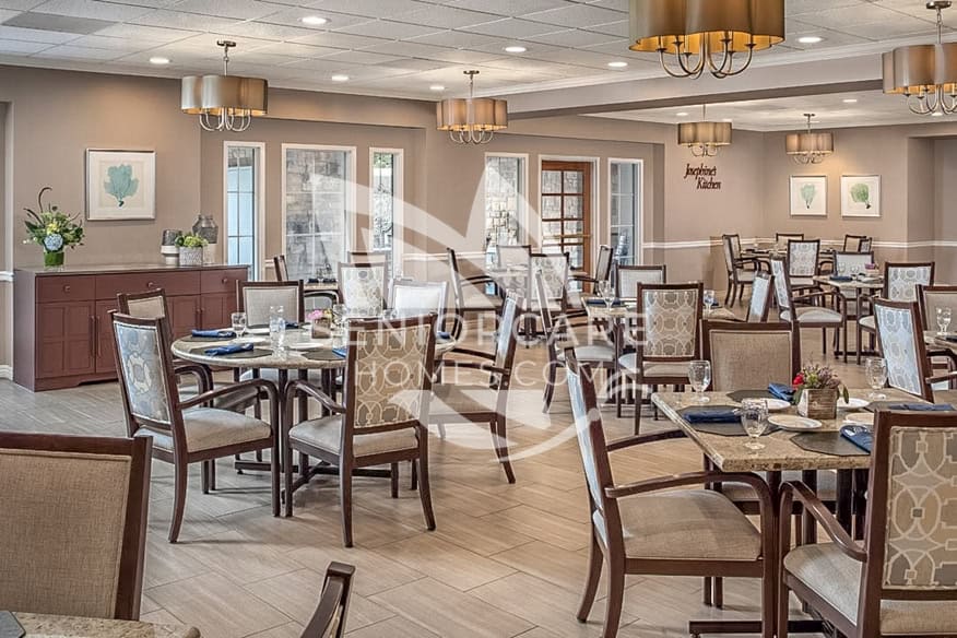 Warm, welcoming Dining room at Belmont Village Cardiff by the ea