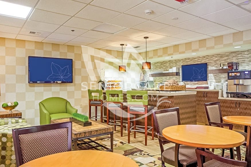Welcoming, bright bistro lounge area at The Carlotta Ivy Park