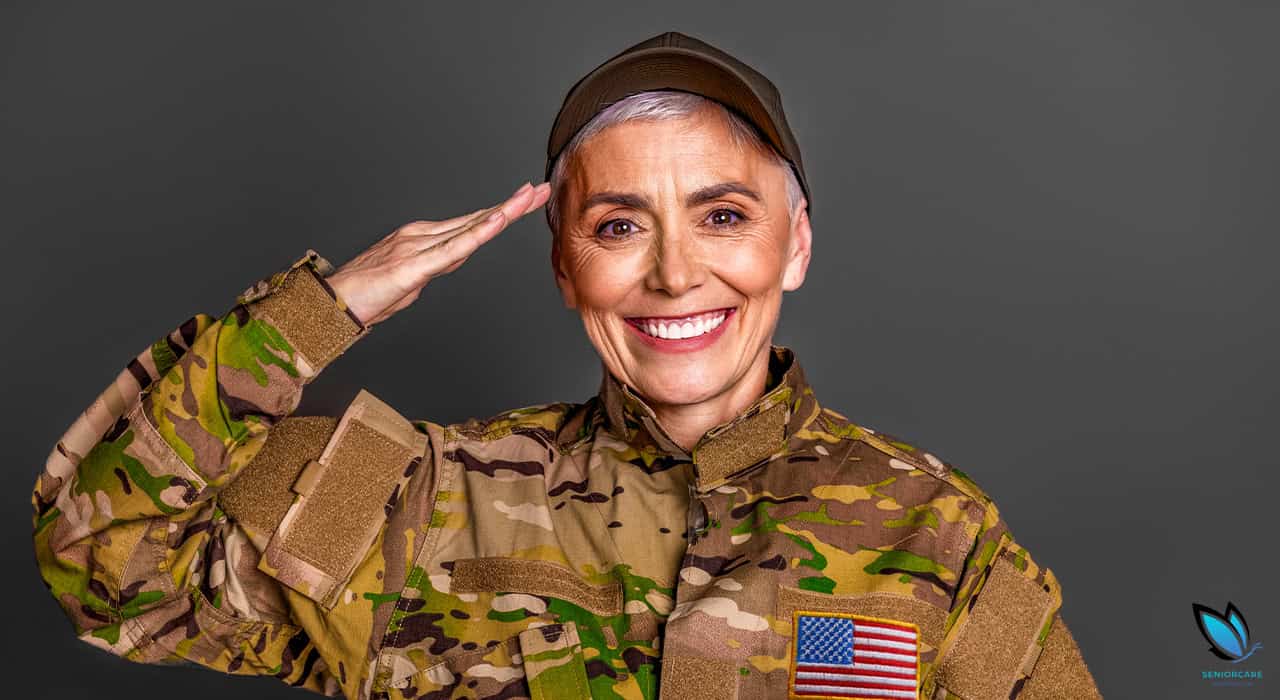 Senior veteran woman saluting and smiling for VA Aid and Attendance for Assisted Living