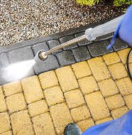 Pressure washing outdoor paving for a clean, refreshed look.