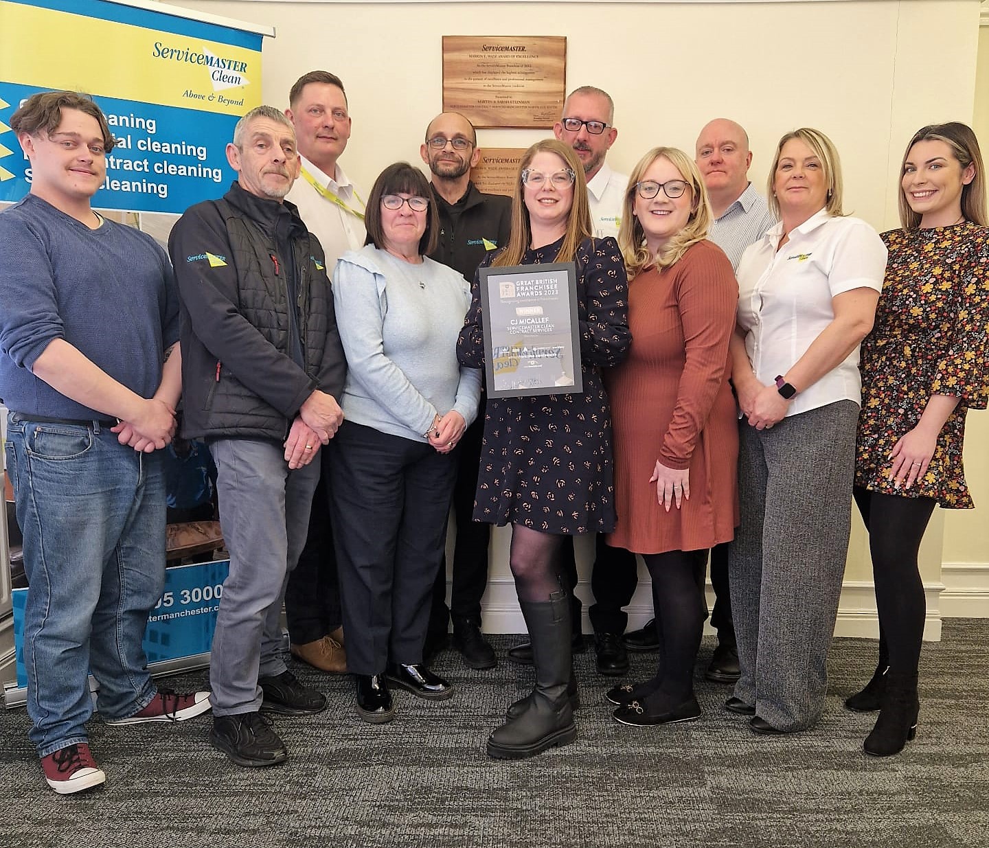 Manchester cleaning team celebrating 25 years of professional cleaning services in Manchester.