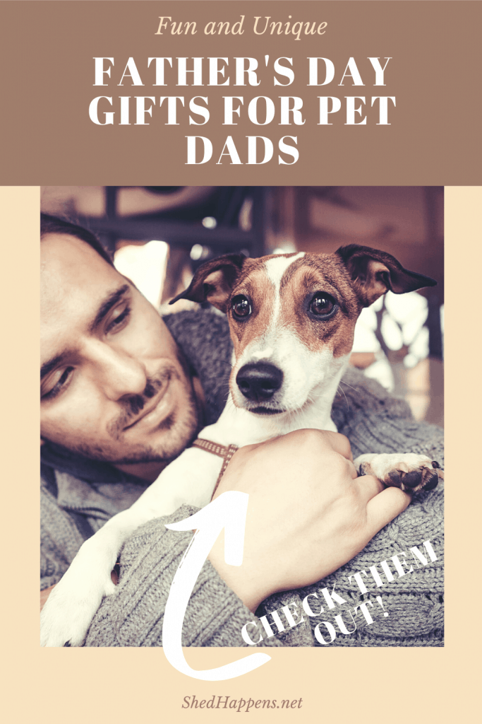 man in a grey sweater holding onto a small brown and white Jack Russell dog with the title Father's Day gifts for pet dads