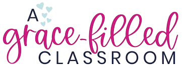 Text reads "A Grace-Filled Classroom," perfect for a Christian classroom or faith-based education setting, with blue hearts above the word "grace." "Grace-filled" is in pink script; the rest appears in blue uppercase letters.