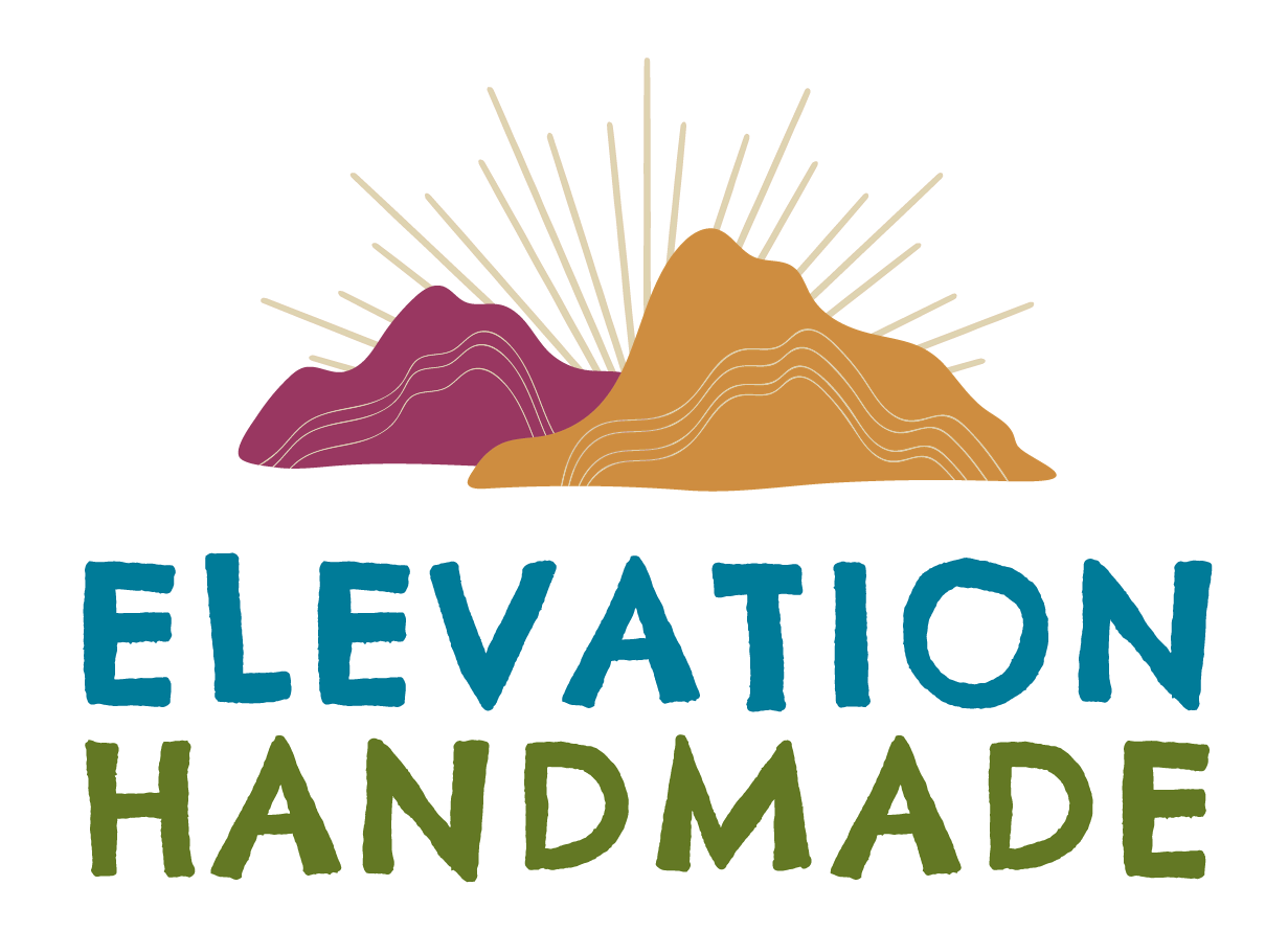 Logo featuring two stylized mountains with sun rays in the background, and "Elevation Handmade" displayed in bold blue and green letters below the image.
