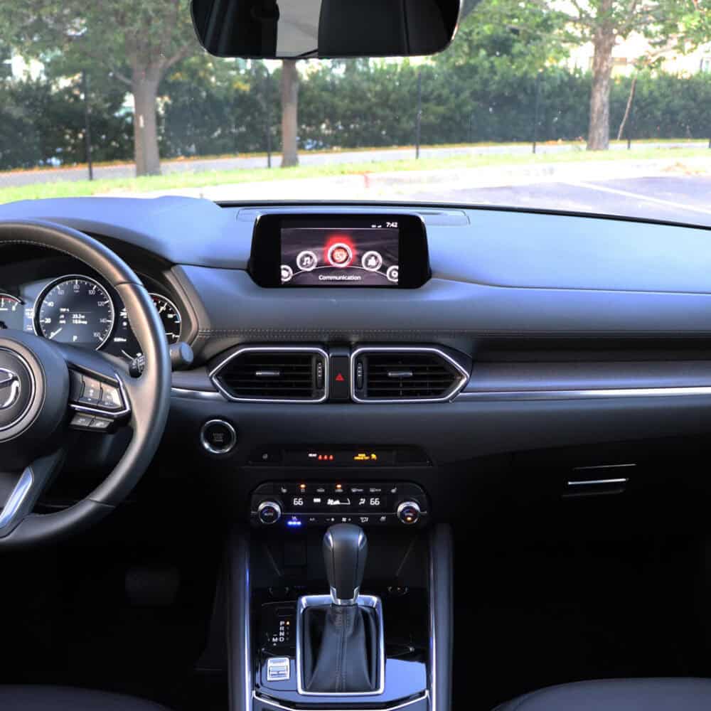 Interior upgrade for Mazda CX-5 2019, including dashboard and console accessories.