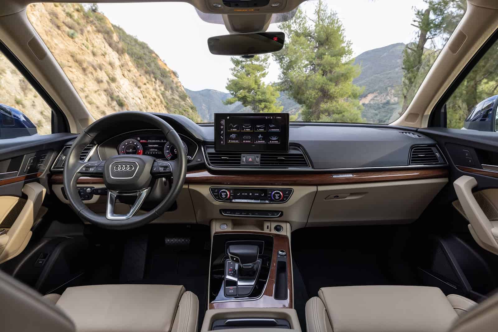Interior of Audi Q5 with premium interior kit, dashboard, and modern features.