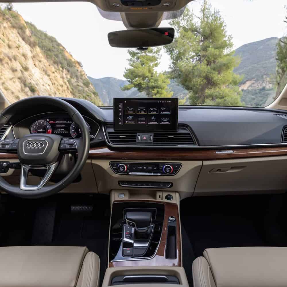 Interior dashboard and infotainment system of Audi Q5 with custom interior kit.