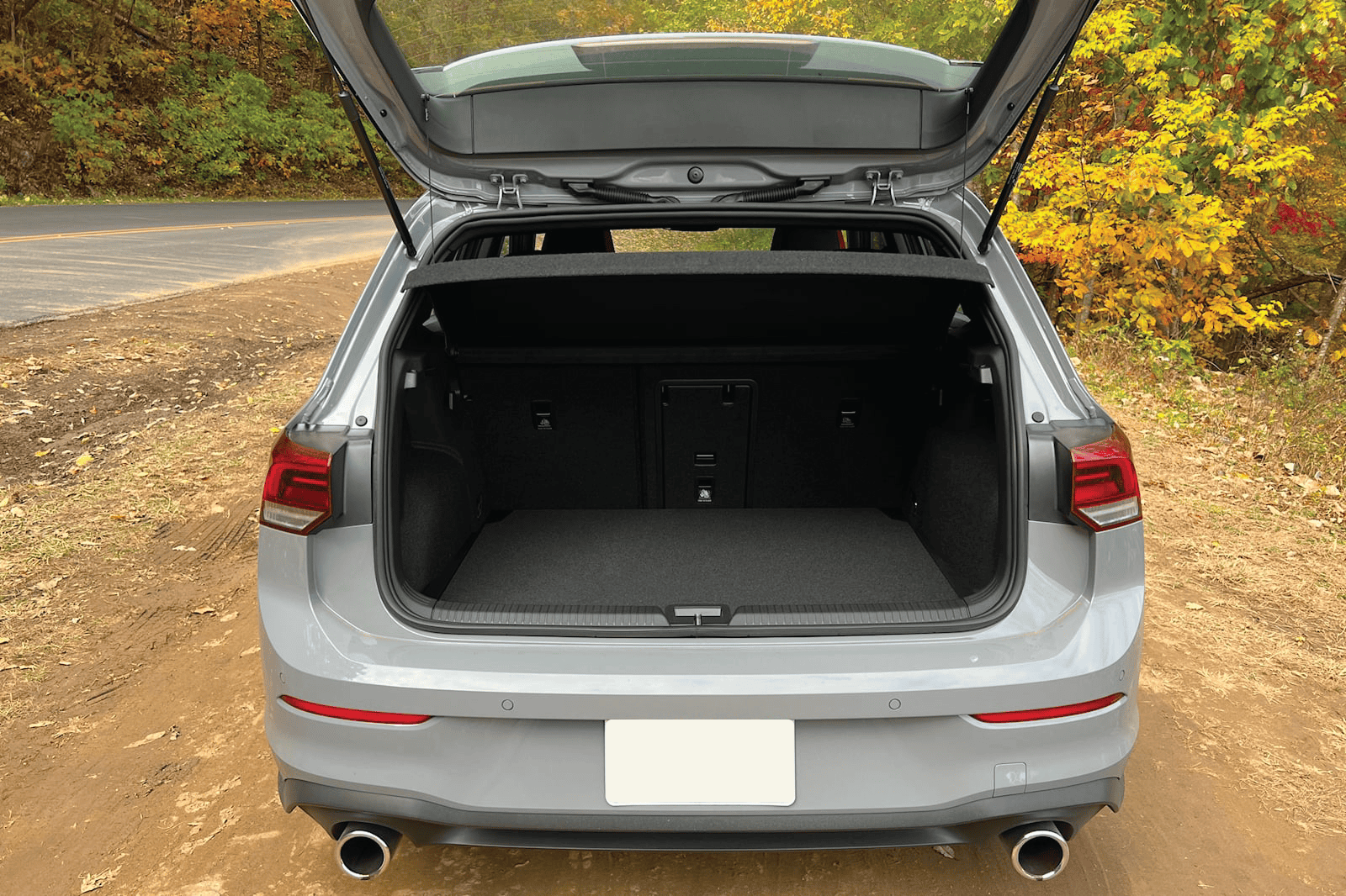 Volkswagen Golf trunk organizer and protective mat for luggage area.