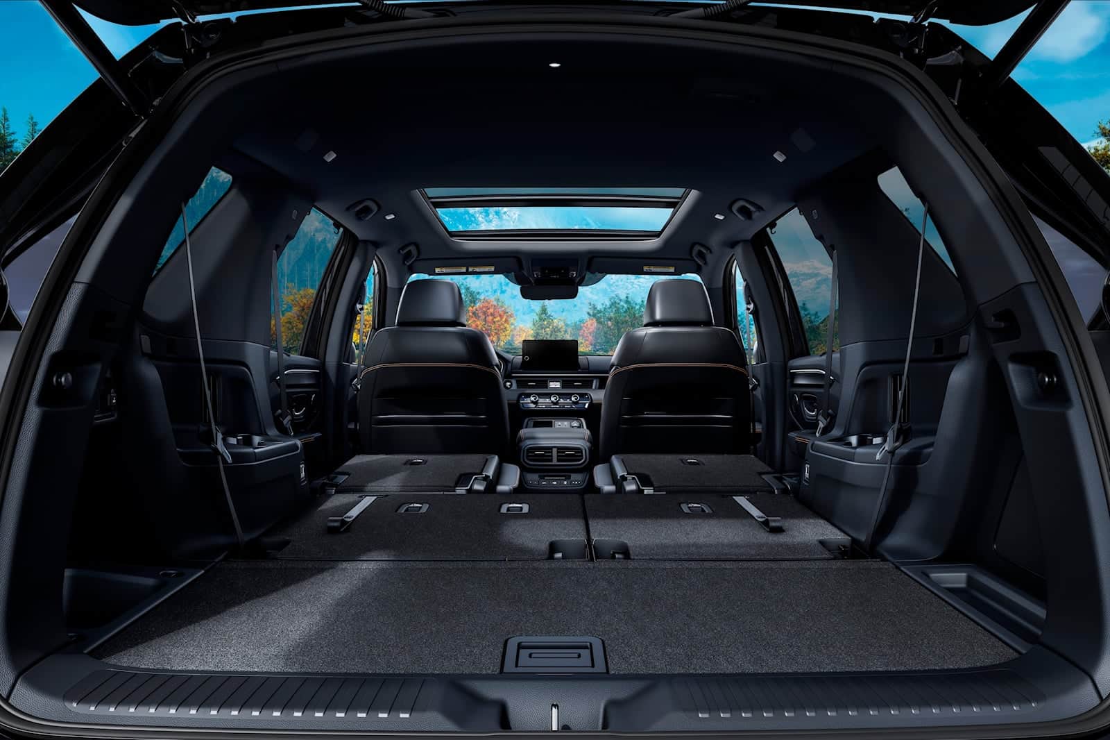 Honda Pilot cargo area with luggage kit for enhanced storage and organization.