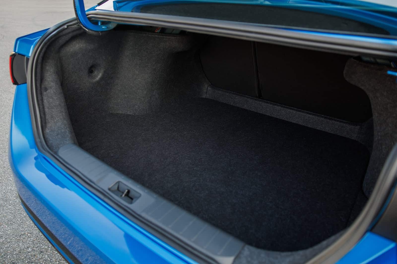 Luggage compartment of Nissan Sentra with custom-fit storage solution.