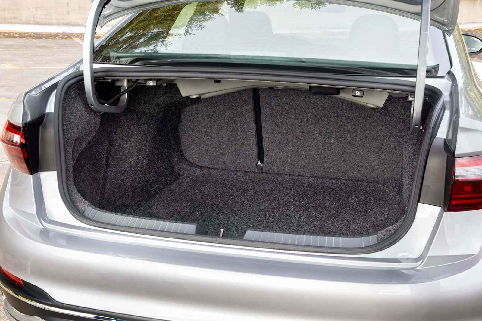 Volkswagen Jetta trunk organizer and protective mat for luggage area.