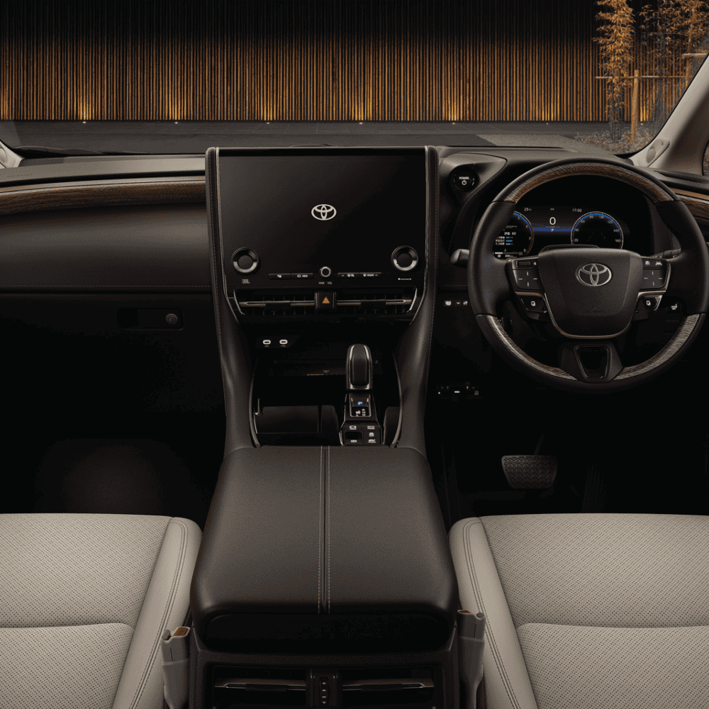 Interior dashboard and steering wheel of Toyota Alphard with custom interior kit.