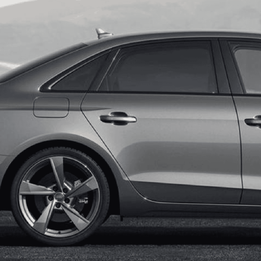 Audi A4 rear wheel damage area, impact assessment, car repair.