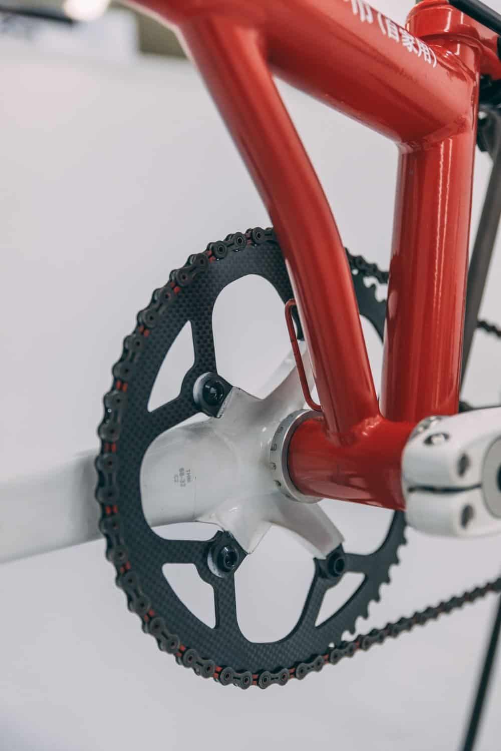 Brompton bike chainring with paint protection film for bike safeguarding.
