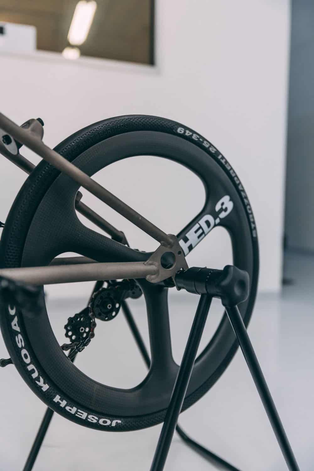 Brompton bicycle wheel featuring protective film for paint protection and enhanced durability.