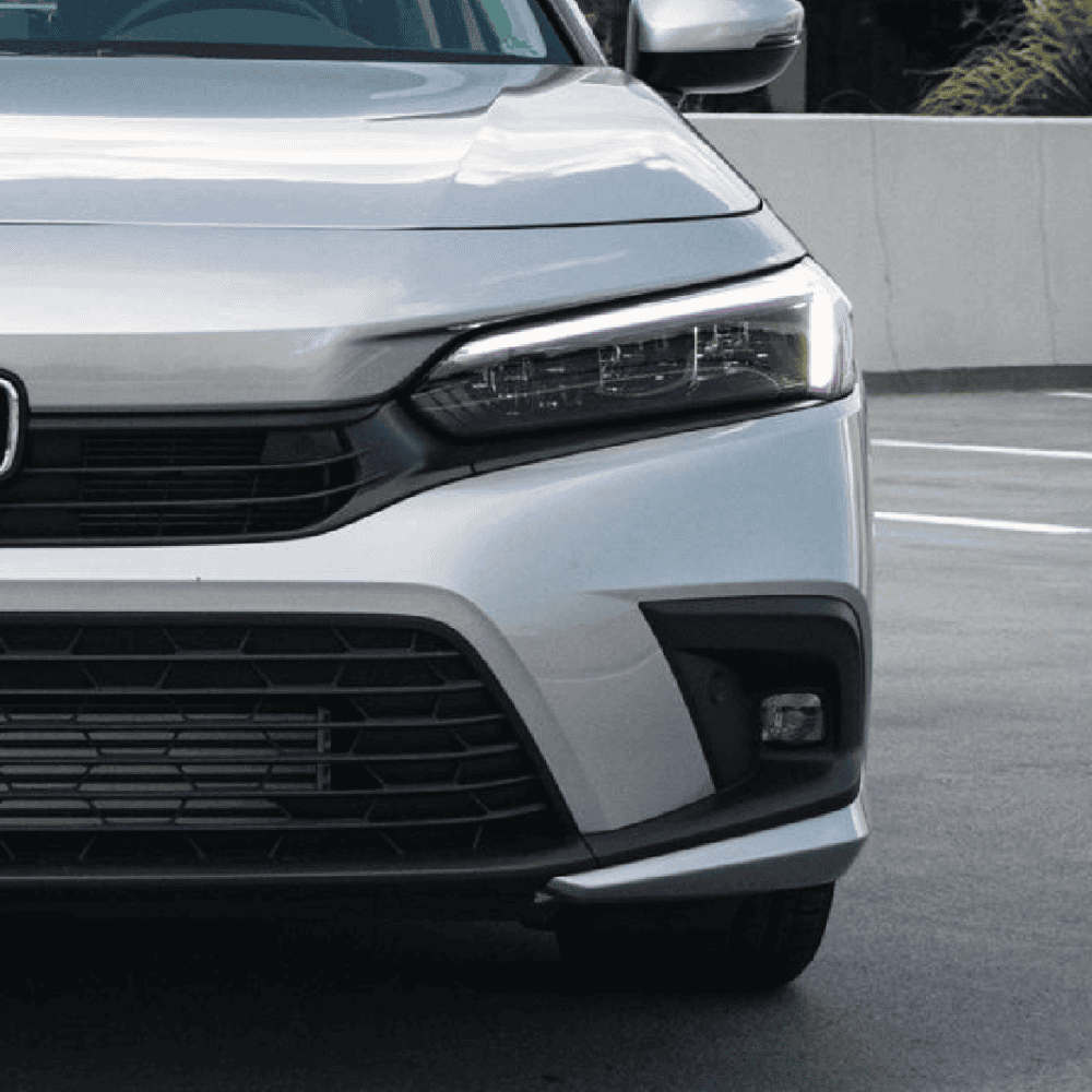 Honda Civic headlamp and fog lamp upgrade for enhanced visibility and style. Perfect for car enthusi.