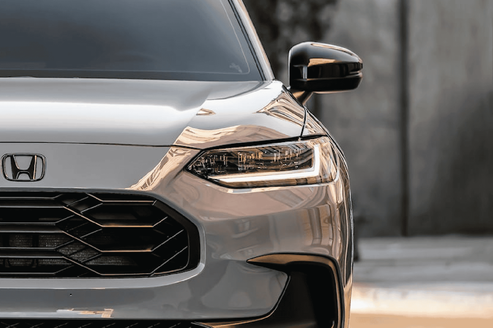 Close-up of Honda HR-V headlamp with LED lighting and sleek design.