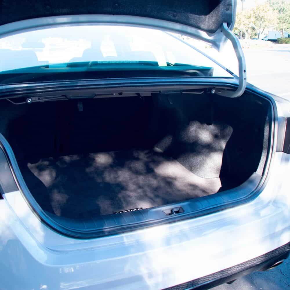 Nissan Altima trunk cargo liner for enhanced storage protection.
